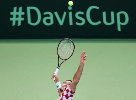 Tennis - Croatia v France - Davis Cup Semi Final - Kresimir Cosic Hall, Zadar, Croatia - 16/9/16 Croatia's Marin Cilic in action during his singles match against France's Lucas Pouille. REUTERS/Antonio Bronic