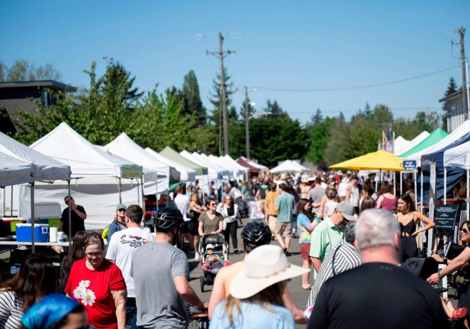 A warm, sunny day brings up to 10,000 people to the Proctor District. On May 11, 2024, crowds picked up local goods for Mother’s Day meals.