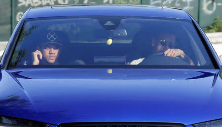 Brazilian soccer player Neymar drives to arrive to Joan Gamper training camp near Barcelona, Spain, August 2, 2017. REUTERS/Stringer