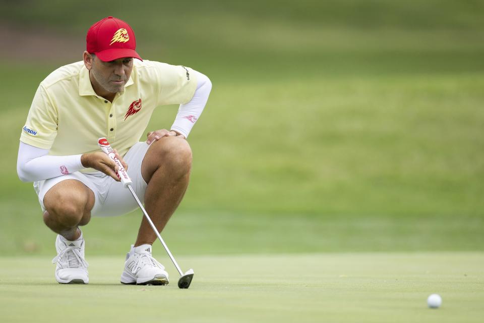 Captain Sergio Garcia of Fireballs GC reads his putt on the fourth green during the first round of LIV golf tournament at the Cedar Ridge Country Club, Friday, May 12, 2023, in Broken Arrow, Okla. (Katelyn Mulcahy/LIV Golf via AP)