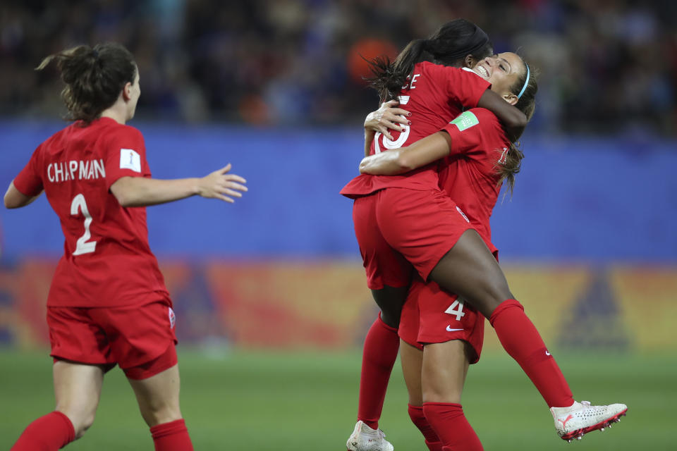 Canada's Nichelle Prince, center, celebrates with her teammates after scoring her side's second goal during the Women's World Cup Group E soccer match between Canada and New Zealand in Grenoble, France, Saturday, June 15, 2019. (AP Photo/Francisco Seco)