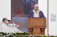 Pope Francis delivers his homily during a mass at the Franso Hariri Stadium in Irbil, Kurdistan Region of Iraq, Sunday, March 7, 2021. The Vatican and the pope have frequently insisted on the need to preserve Iraq's ancient Christian communities and create the security, economic and social conditions for those who have left to return.(AP Photo/Andrew Medichini)