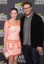 Comedian Seth Rogen hit the red carpet with his wife Lauren Miller who appeared to be wearing a 1950s housewife apron.