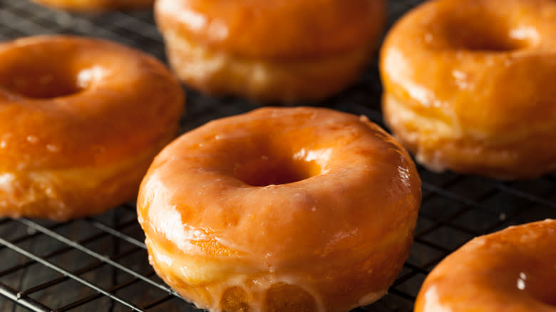 glazed donuts on a cooling rack