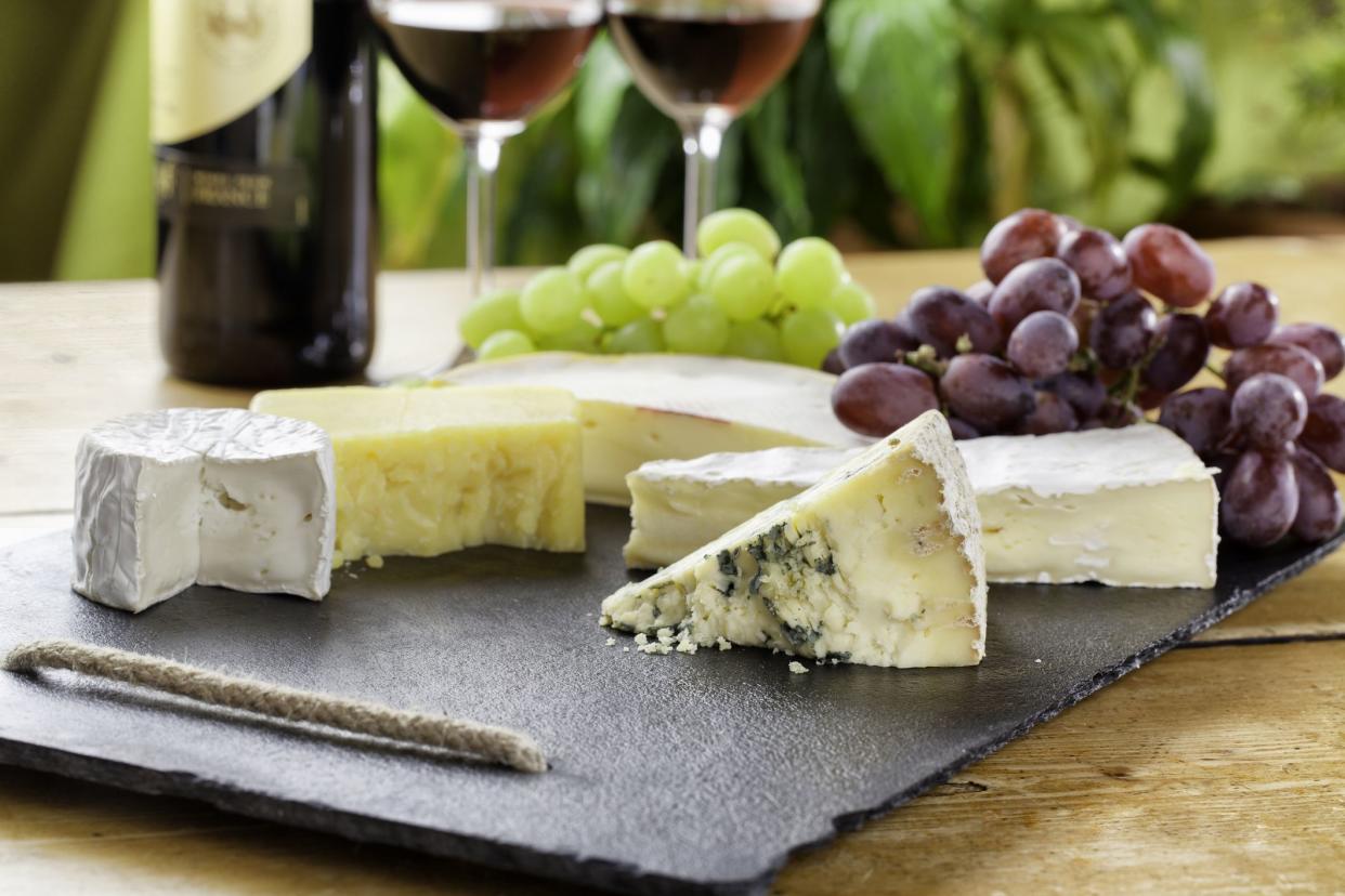 A selection of cheeses and red wine. Similar images: