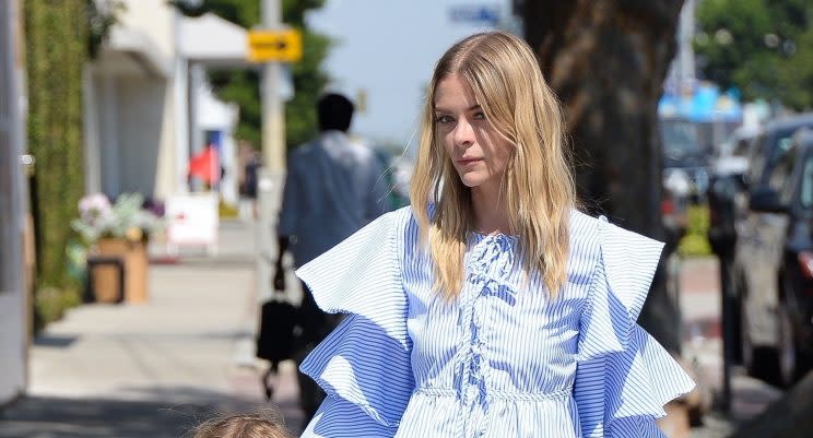 Jaime King wears a ruffled blouse from the fast-fashion site SheIn.