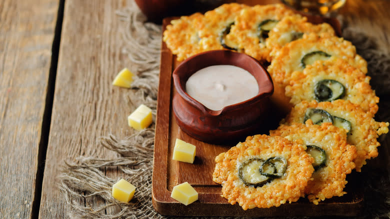 parmesan crisps topped with jalepenos and served with a creamy dip