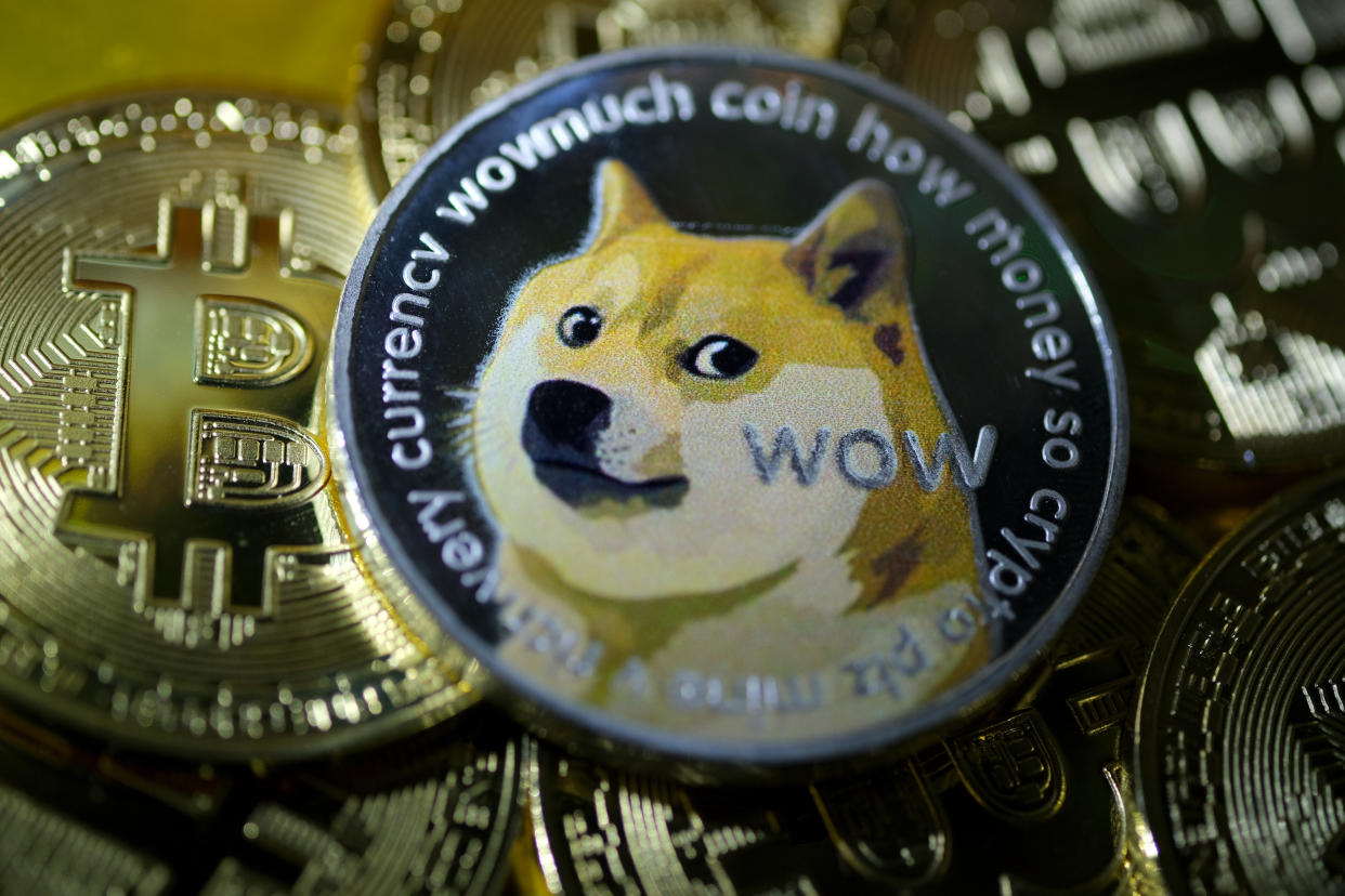 KATWIJK, NETHERLANDS - JANUARY 29: In this photo illustration, visual representations of digital cryptocurrencies, Dogecoin and Bitcoin are arranged on January 29, 2021 in Katwijk, Netherlands.  (Photo by Yuriko Nakao/Getty Images)