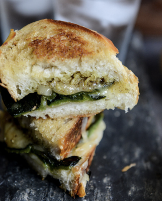A grilled cheese for the international jet-setter. Recipe: Sourdough Grilled Cheese With Roasted Poblanos, Smoked Cheddar, And Curried Brown Butter