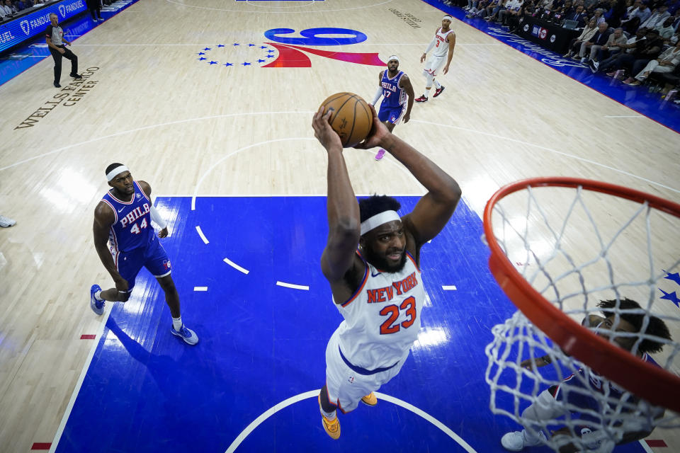 New York Knicks' Mitchell Robinson dunks during the second half of Game 6 in an NBA basketball first-round playoff series against the Philadelphia 76ers, Thursday, May 2, 2024, in Philadelphia. (AP Photo/Matt Slocum)