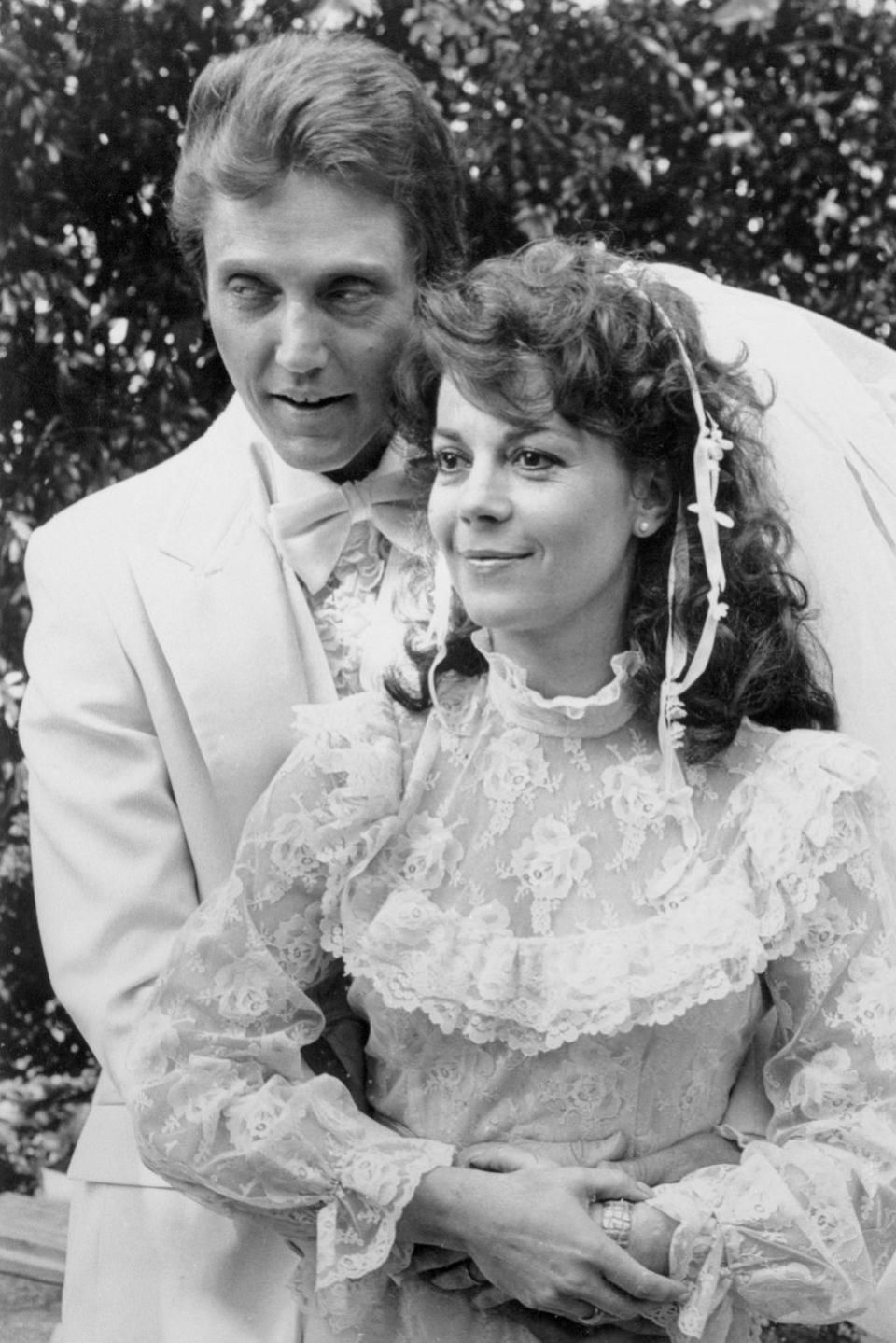 <p>Wood's role in <em>Brainstorm</em> was supposed to be a major comeback for the star, after taking a step back from the spotlight throughout the '70s. Here, she poses with costar Christopher Walken. </p>