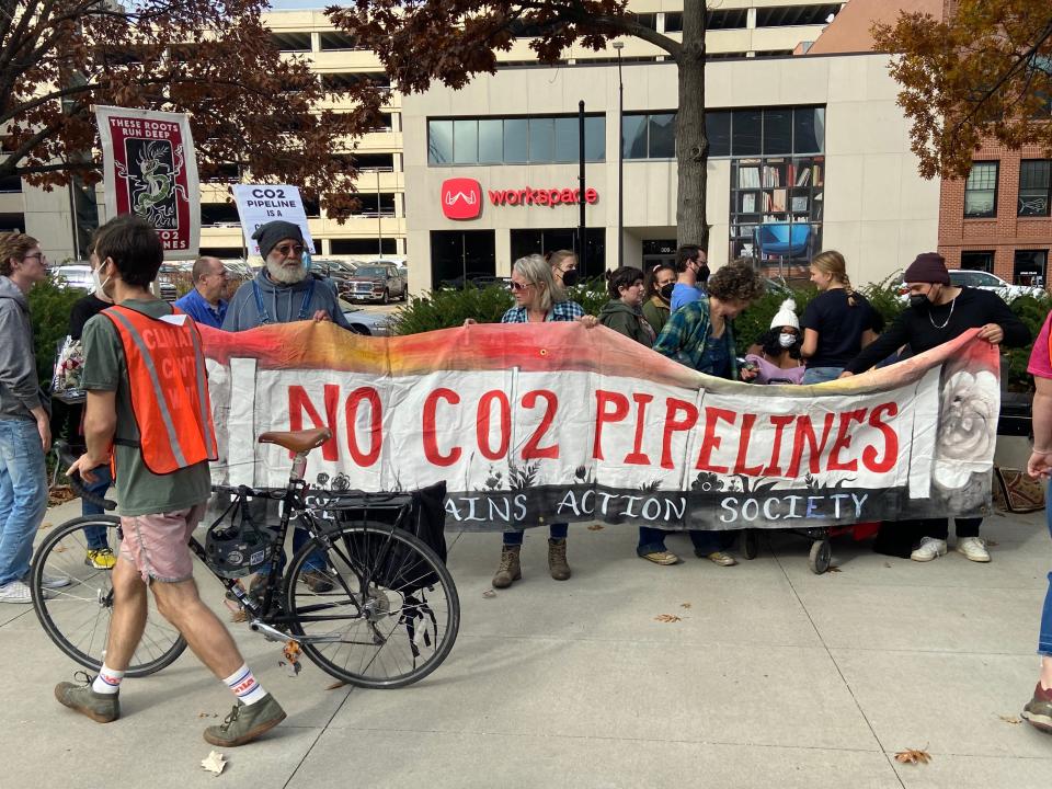 Protesters gathered at Cowles Commons in downtown Des Moines this week to oppose three proposed carbon-capture pipelines across the state.