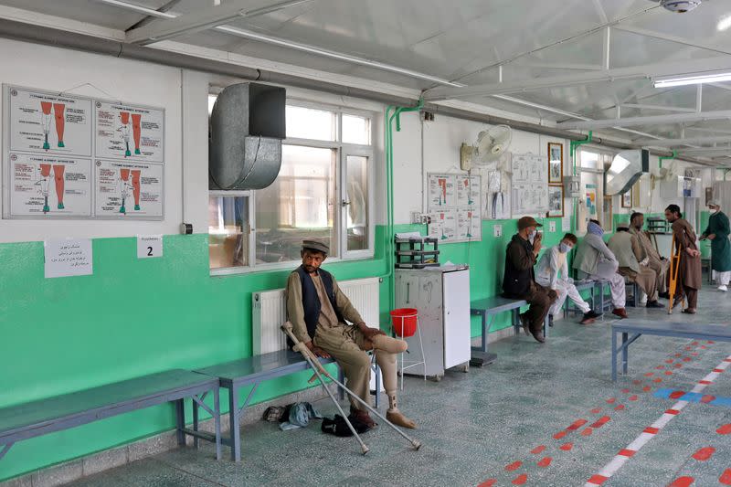Amanullah sits at the Red Cross rehabilitation center in Kabul