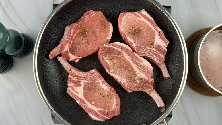 pork chops in frying pan
