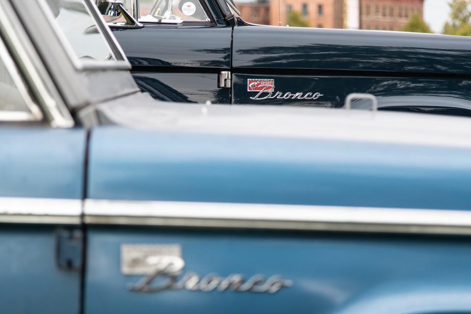 The 1966 Ford Bronco, left, and Gateway Bronco's re-imagined edition in Detroit. With a VIN number of 000, this one is the first Ford Bronco ever to roll off the production line.