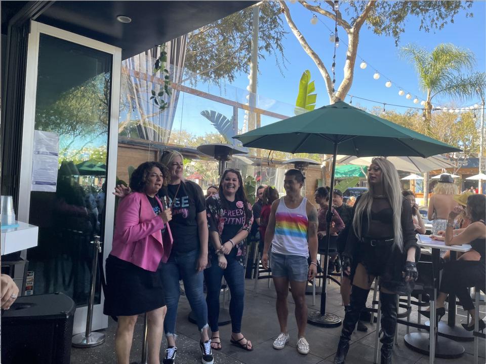 (L to R) Disability rights advocate Judy Mark,"Free Britney" leaders Megan Radford, Vanessa Velasquez, and Kevin Wu, and drag performer Nyx Litre speak at Beaches in West Hollywood.