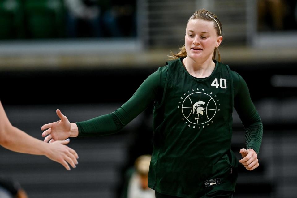 Michigan State's Julia Ayrault celebrates after a basket during open practice on Saturday, Oct. 2, 2021, at the Breslin Center in East Lansing.