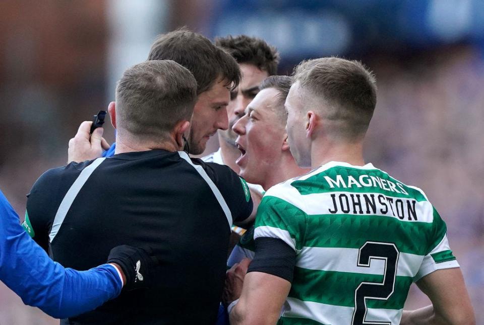 Football players arguing at a football match.