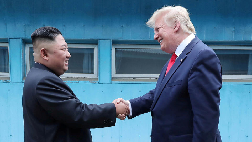 U.S. President Donald Trump shakes hands with North Korean leader Kim Jong Un as they meet at the demilitarized zone separating the two Koreas, in Panmunjom, South Korea, June 30, 2019. (KCNA via Reuters)