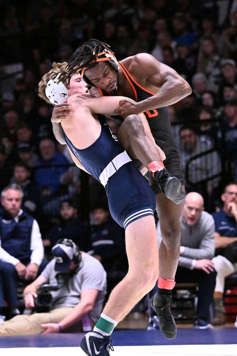 Penn State’s Terrell Barraclough (left), seen here in a December 2022 photo, is one of five wrestlers with ties to the Nittany Lions needing one more win to secure an Olympic Team Trials spot.