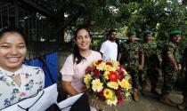 Supporters of Sri Lanka People's Front party presidential election candidate and former wartime defence chief Gotabaya Rajapaksa gather in front of his residence to wish him well after he won the presidential election in Colombo