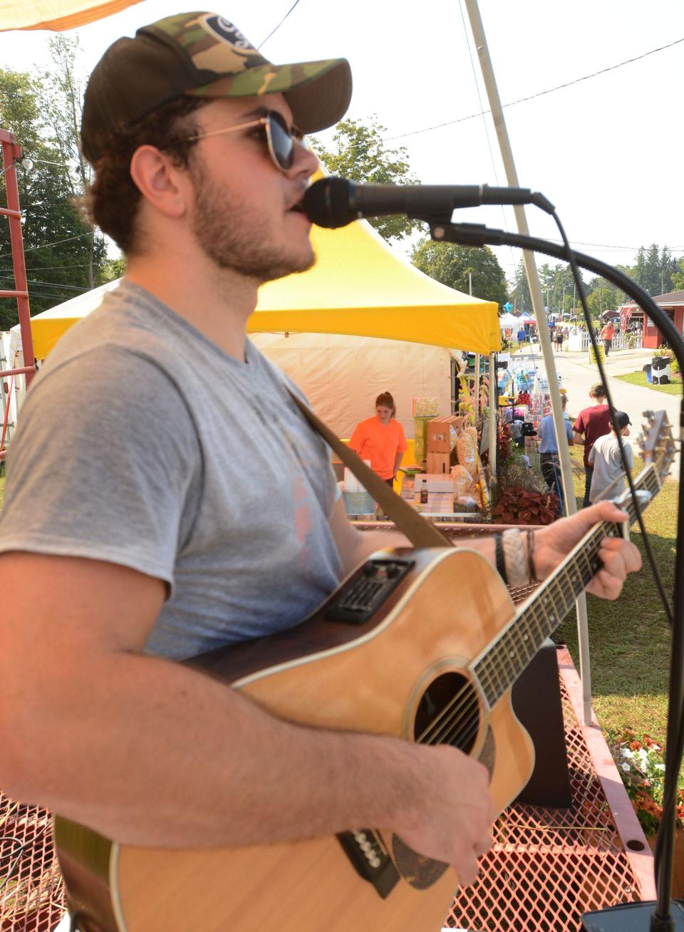 Nick Casey of West Greenwich, R. I. sings old school country songs during the second day of the Brooklyn Fair in this file photo