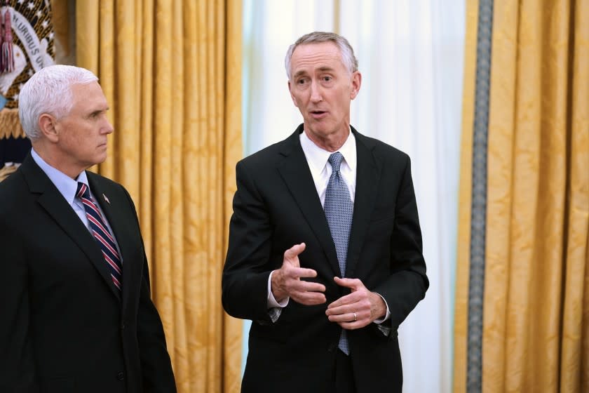 Vice President Mike Pence, and Daniel O'Day, the CEO of Gilead, in the Oval Office of the White House while meeting with President Donald Trump in Washington, Friday, May 1, 2020. The Food and Drug Administration on Friday issued an emergency approval for the antiviral drug remdesivir, made by Gilead, as a treatment for patients with COVID-19, the illness caused by the coronavirus. (Erin Schaff/The New York Times)