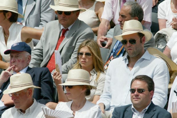 Jennifer Aniston and Vince Vaughn attend the men's final of the French Tennis Open at Roland Garros Arena, in Paris, France on June 11, 2006.<p><a href="https://www.gettyimages.com/detail/115506162" rel="nofollow noopener" target="_blank" data-ylk="slk:Marc Ausset-Lacroix/Getty Images;elm:context_link;itc:0;sec:content-canvas" class="link ">Marc Ausset-Lacroix/Getty Images</a></p>