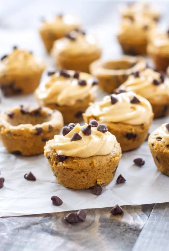 <p>Spoonful of Flavor</p><p>Mini pumpkin chocolate chip cookie cups are filled with a delicious pumpkin cream cheese frosting! They are the perfect little treat to make this fall!</p><p><strong>Get the recipe: <a href="https://www.spoonfulofflavor.com/pumpkin-chocolate-chip-cookie-cups-with-pumpkin-cream-cheese-frosting/" rel="nofollow noopener" target="_blank" data-ylk="slk:Pumpkin Chocolate Chip Cookie Cups;elm:context_link;itc:0;sec:content-canvas" class="link rapid-noclick-resp">Pumpkin Chocolate Chip Cookie Cups</a></strong></p>