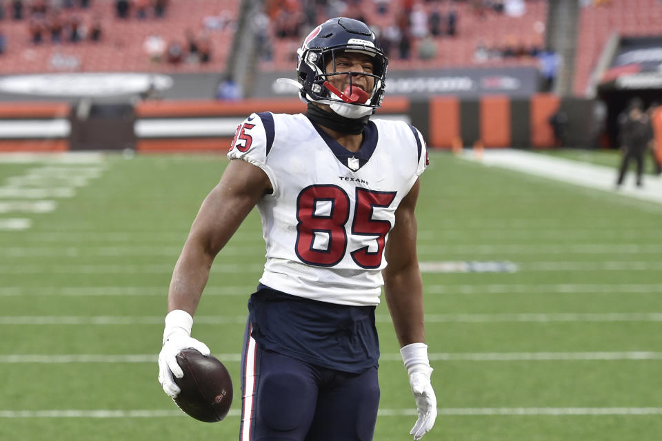 Houston Texans tight end Pharaoh Brown celebrates a 16-yard touchdown during the second half of an NFL football game against the Cleveland Browns, Sunday, Nov. 15, 2020, in Cleveland. (AP Photo/David Richard)
