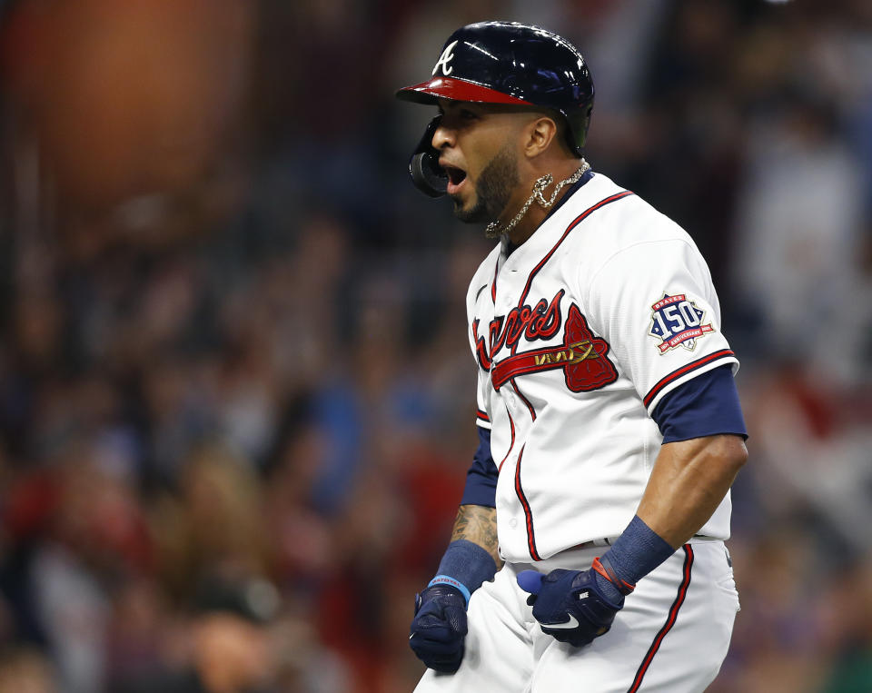 ATLANTA, GEORGIA - OCTOBER 23: Left fielder Eddie Rosario #8 of the Atlanta Braves reacts after hitting a three-run home run in the fourth inning during Game Six of the League Championship Series against the Los Angeles Dodgers at Truist Park on October 23, 2021 in Atlanta, Georgia. (Photo by Michael Zarrilli/Getty Images)