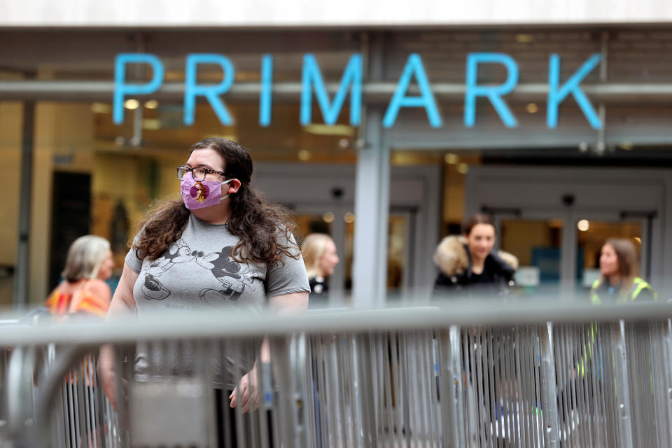 People queue outside a Primark store, after the branch's reopening amid the coronavirus disease (COVID-19) in Hanley, Britain June 15, 2020. REUTERS/Carl Recine