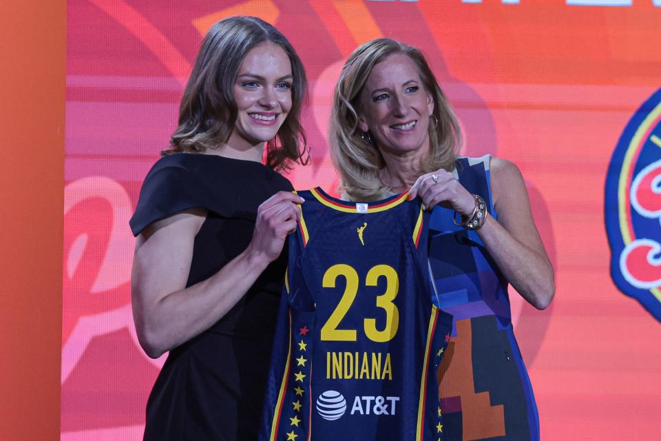 Indiana star Grace Berger poses with WNBA Commissioner Cathy Engelbert after being drafted with the No. 7 overall pick by the Indiana Fever.
