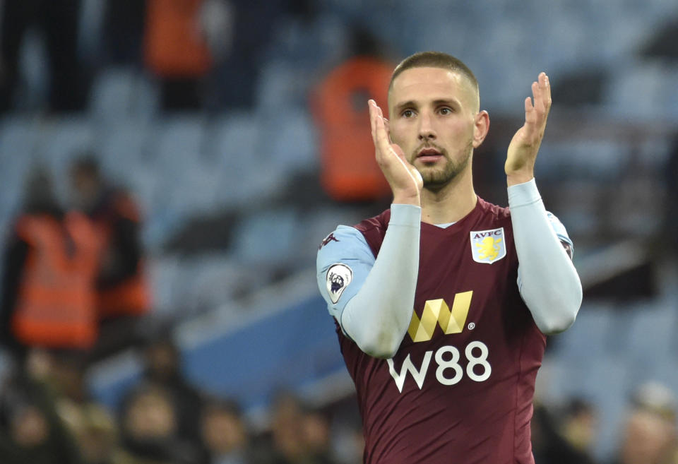 Aston Villa's Conor Hourihane celebrates their victory after the English Premier League soccer match between Aston Villa and Newcastle United at Villa Park in Birmingham, England, Monday, Nov. 25, 2019. (AP Photo/Rui Vieira)