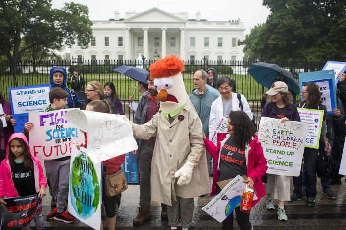 <p>Members of the Union for Concerned Scientists pose for photographs with Muppet character Beaker in front of The White House before heading to the National Mall for the March for Science on April 22, 2017 in Washington, D.C. (Jessica Kourkounis/Getty Images) </p>