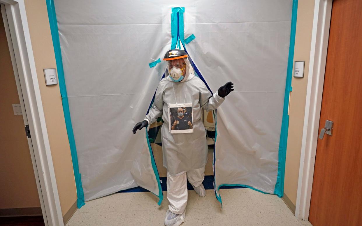 Dr. Joseph Varon walks through the Coronavirus Unit at United Memorial Medical Center -  AP/David J. Phillip