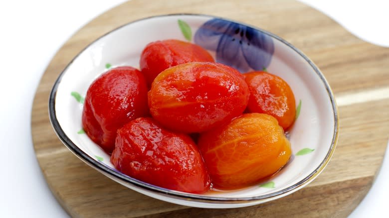 whole canned tomatoes in bowl