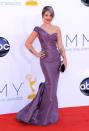 "Fashion Police" host Kelly Osbourne was pretty in a purple one-shoulder gown by Zac Posen, which perfectly matched her purple locks. "I can't wait for you guys to see my second dress for #LRC @Zac_Posen made it for me it's bloody amazing! #Emmys #ERedcarpet," she tweeted. We have to agree, although she could have used some makeup to cover up her tattoos!