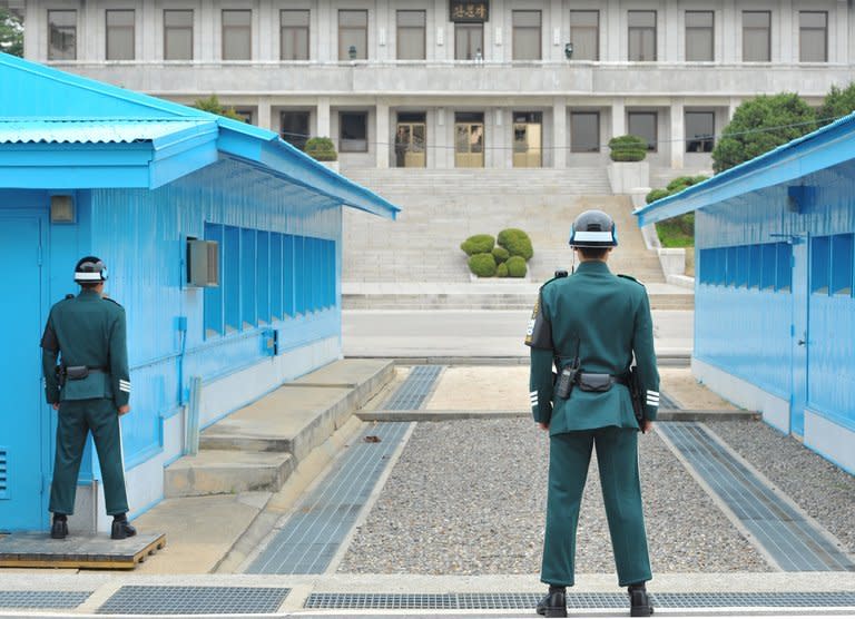 South Korean soldiers face North Korean side at the truce village of Panmunjom in the Demilitarised Zone (DMZ), on April 23, 2013. S.Korea on Saturday said the North had agreed to hold working-level talks on Sunday in Panmunjom, following months of soaring tensions and threats of nuclear war