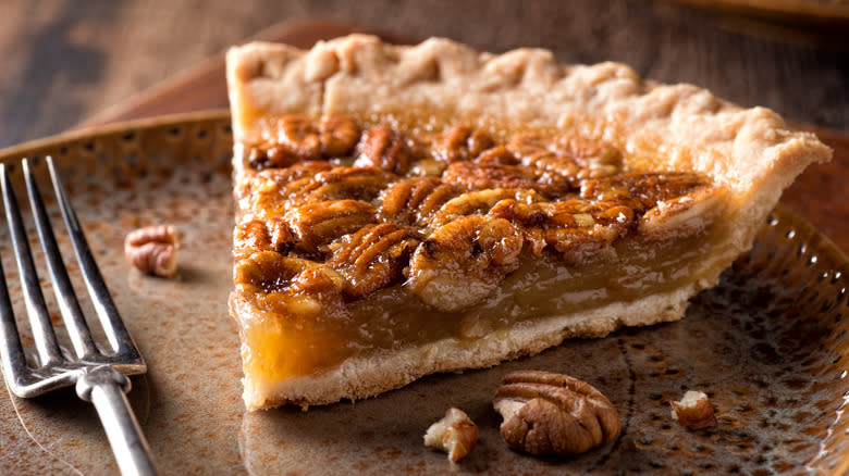 Plated pecan pie with fork