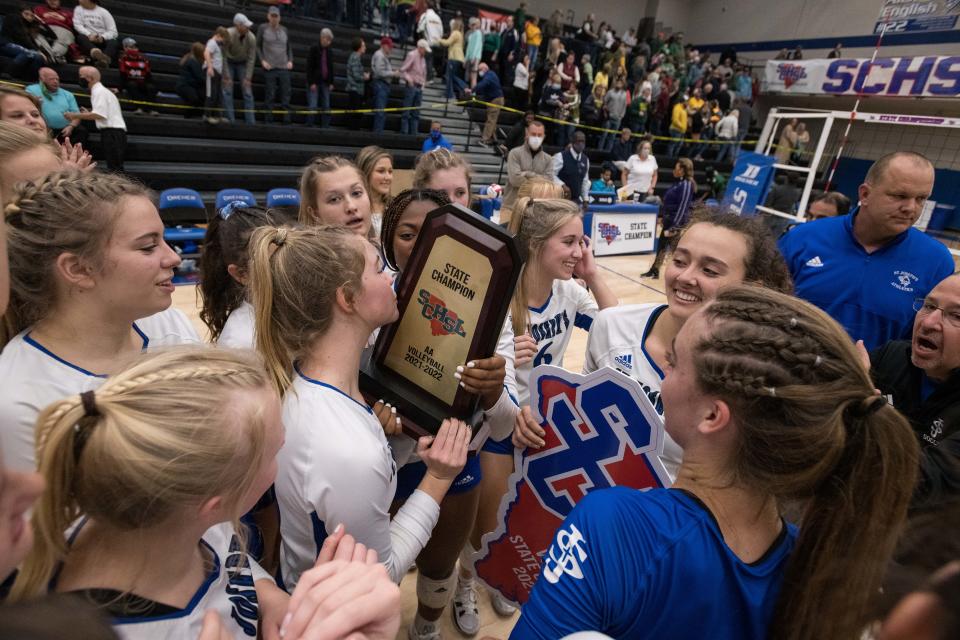 St. Joseph’s Knights players react to winning the Class AA state finals match against North Central at Dreher High School Saturday Nov. 6, 2021.