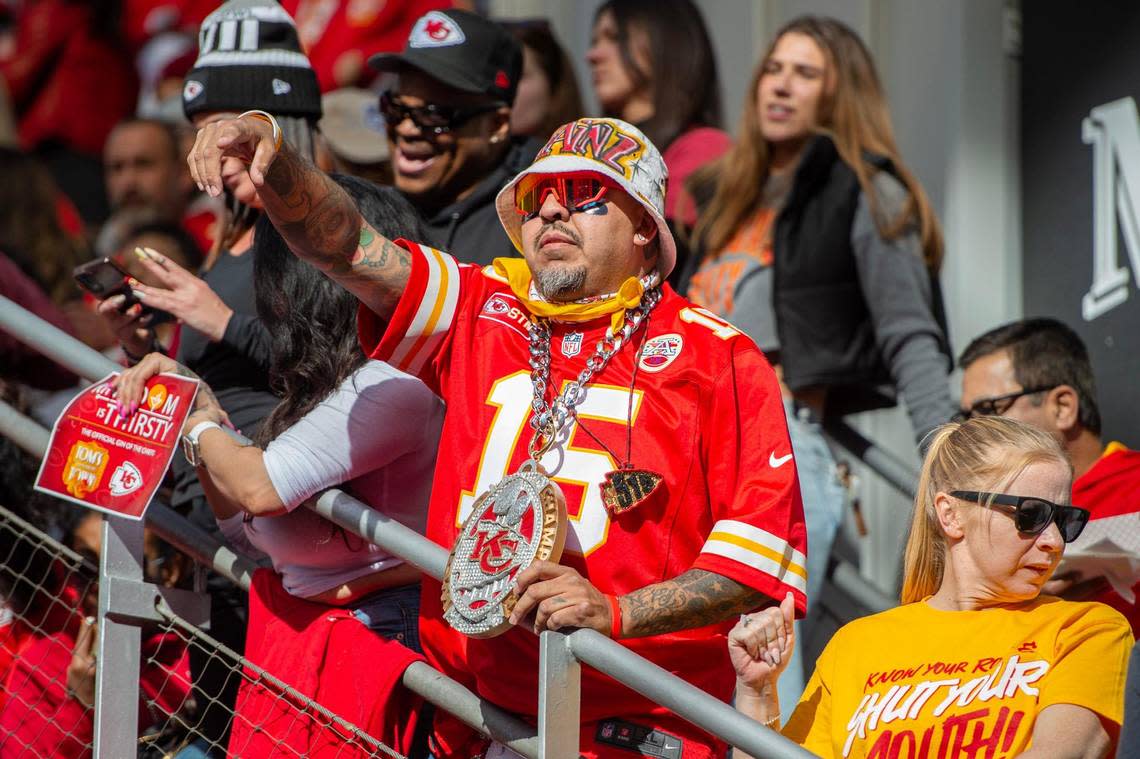 Sam Vasquez cheers along with other fans while waiting to watch the Kansas City Chiefs take on the Philadelphia Eagles at the Super Bowl LVII watch party at Power and Light District on Feb. 12, 2023, in Kansas City.