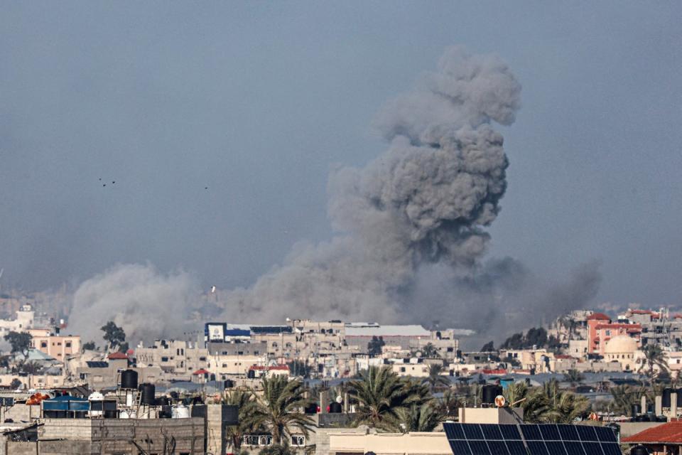 Smoke billows after an Israeli strike in Rafah in southern Gaza on 26 January. (AFP via Getty Images)