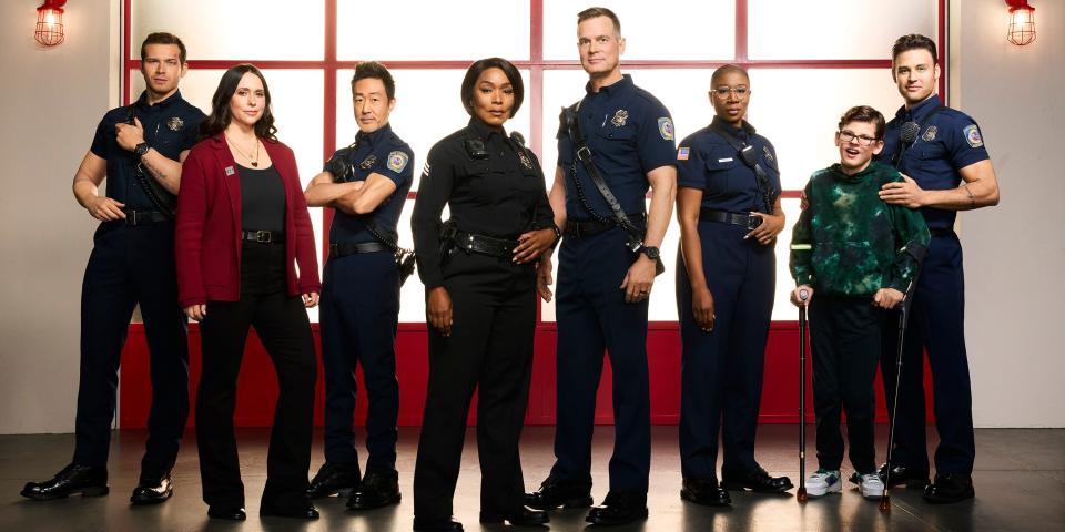 The cast of Season 7 of 9-1-1 on ABC. From left to right: Oliver Stark, Jennifer Love Hewitt, Kenneth Choi, Angela Bassett, Peter Krause, Aisha Hinds, Gavin McHugh, and Ryan Guzman.