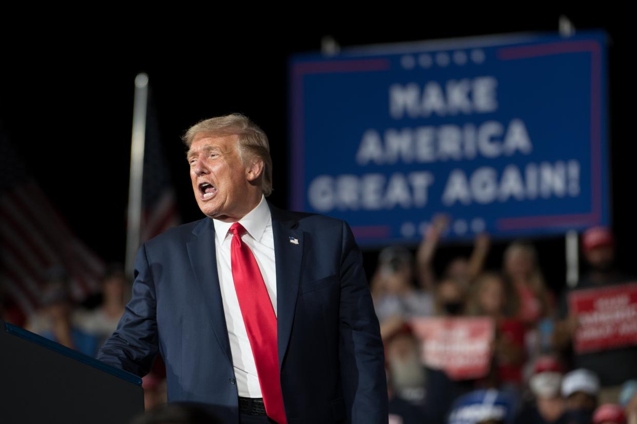 US president Donald Trump during a campaign event on Tuesday (Getty Images)