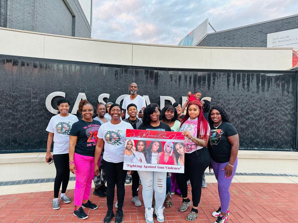 Felicia Gilyard (front left in white shirt) and the Princess Marlacia Chanel Kitchen Foundation at Cascades Park.