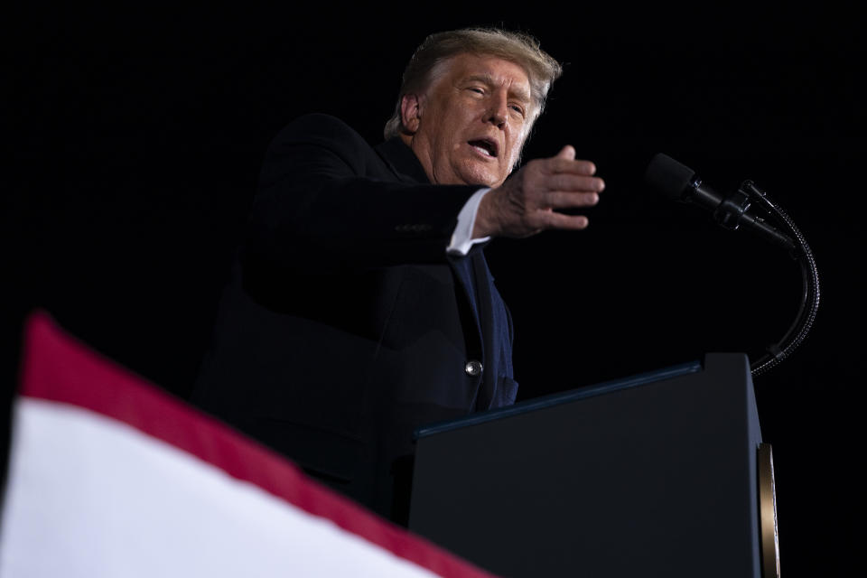 President Donald Trump speaks during a campaign rally for Sen. Kelly Loeffler, R-Ga., and David Perdue, at Dalton Regional Airport, Monday, Jan. 4, 2021, in Dalton, Ga. (AP Photo/Evan Vucci)