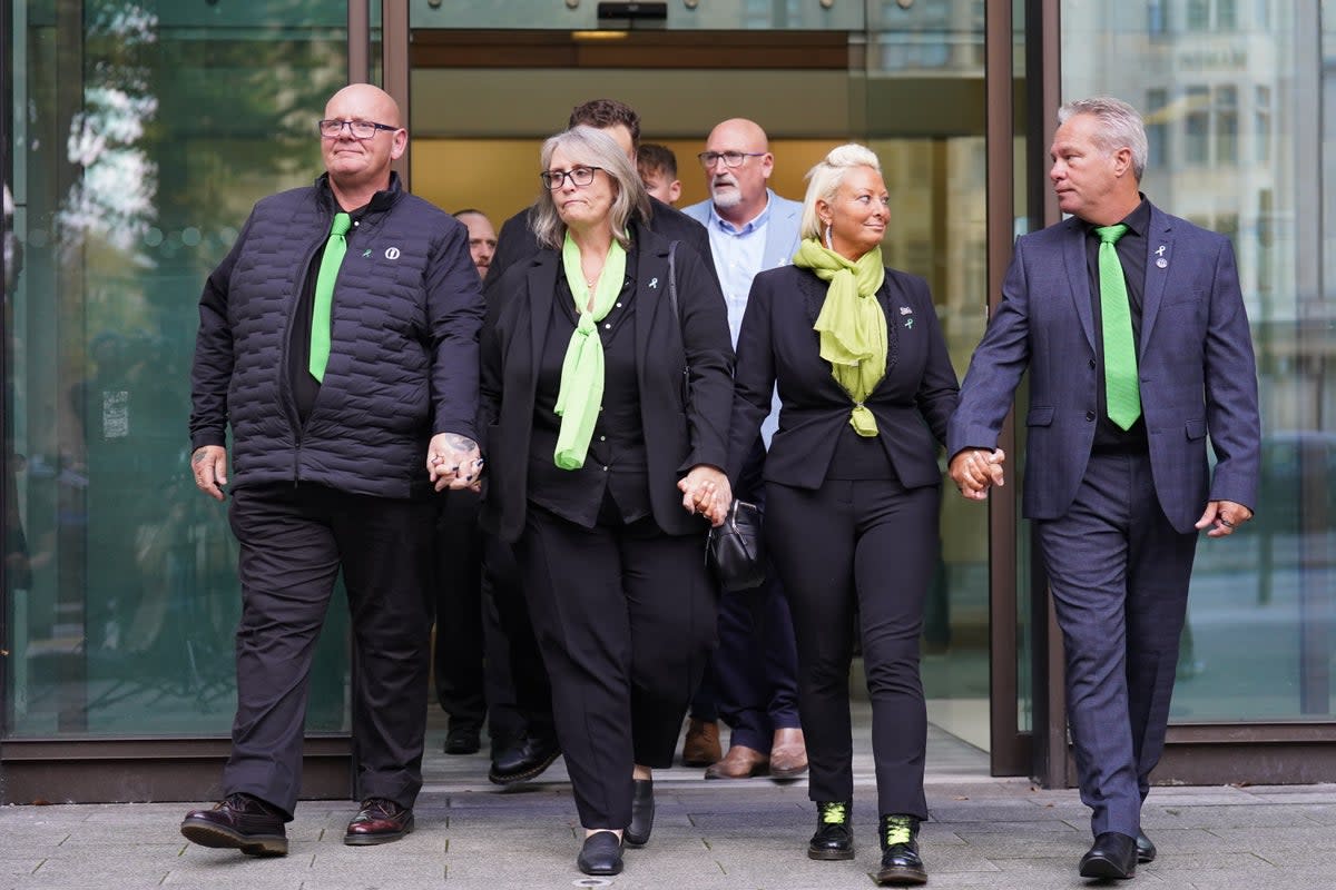 Harry Dunn’s father Tim Dunn (left) and mother Charlotte Charles (second from right) paid emotional tributes to their son at his inquest on Monday (James Manning/PA) (PA Archive)