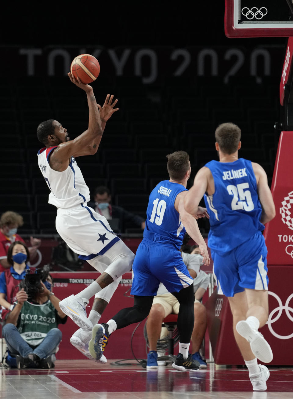 United States's Kevin Durant, left, shoots against the Czech Republic during a men's basketball preliminary round game at the 2020 Summer Olympics, Saturday, July 31, 2021, in Saitama, Japan. (AP Photo/Eric Gay)