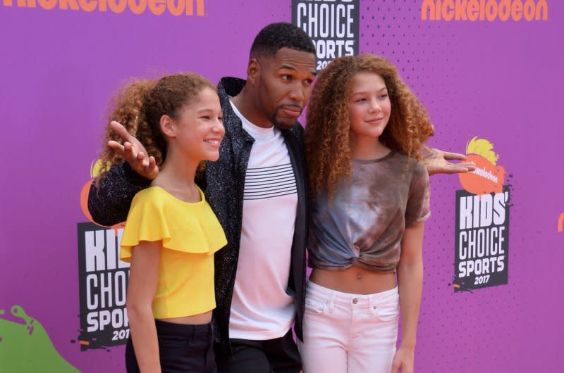 Michael Strahan and his daughters Sophia and Isabella attend the Nickelodeon's Kids' Choice Sports Awards in 2017. File Photo by Jim Ruymen/UPI
